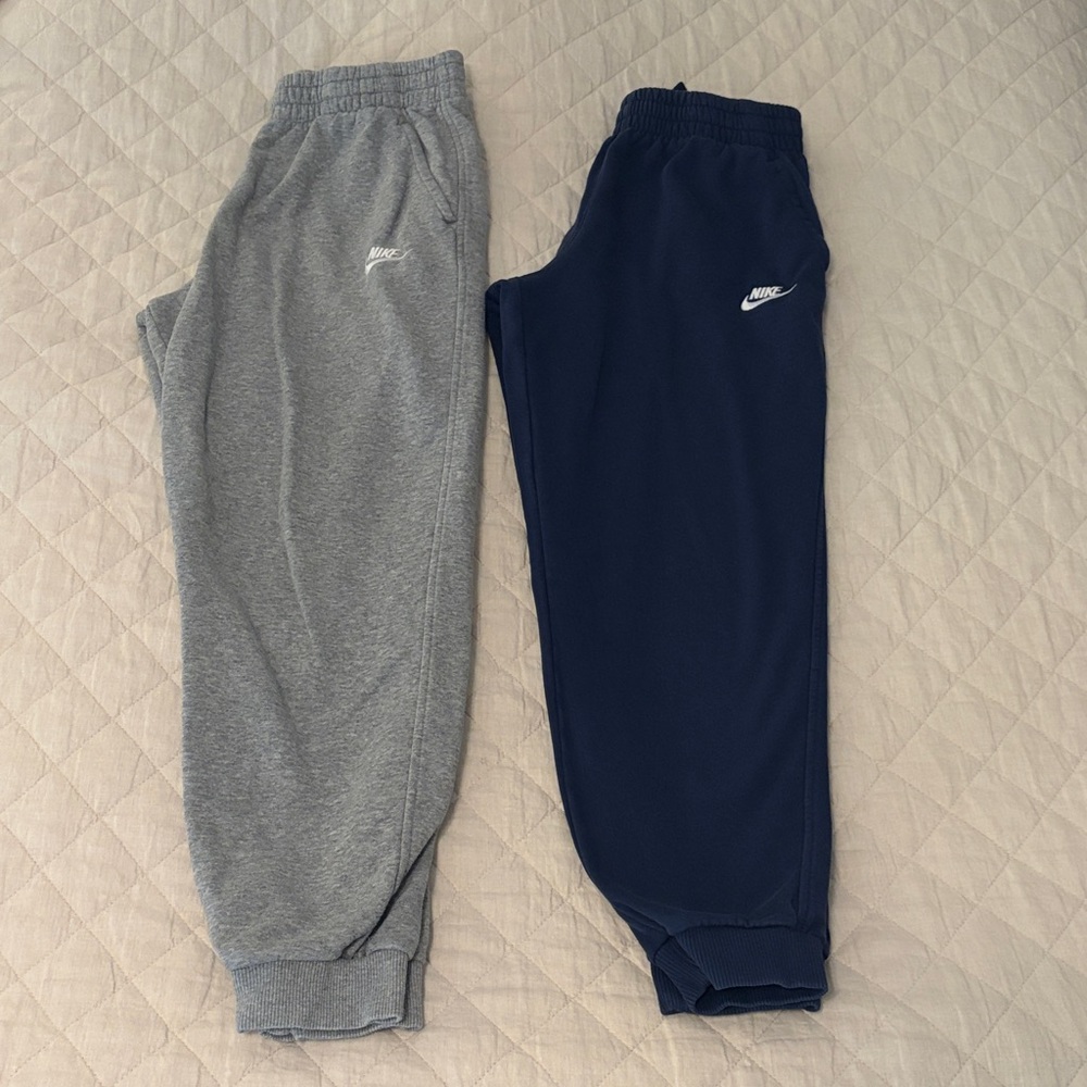 2 pairs of Nike Club Fleece Joggers - Gray, and Navy